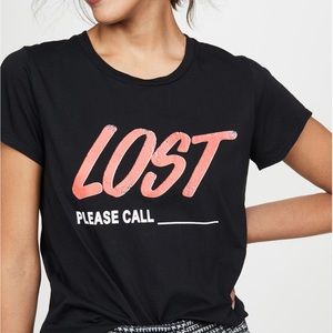 Pam and Gela tee.. cheeky subtly faded logo. Light weight Jersey fabric.